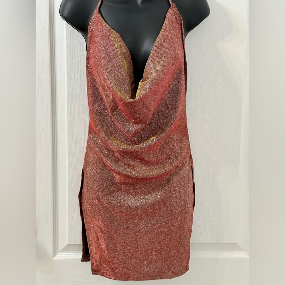Backless Mini Dress that reflects different hues with shimmer. Size M